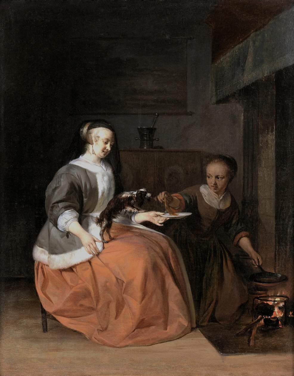 Młoda kobieta i służąca karmią psa naleśnikiem autorstwa Gabriel Metsu