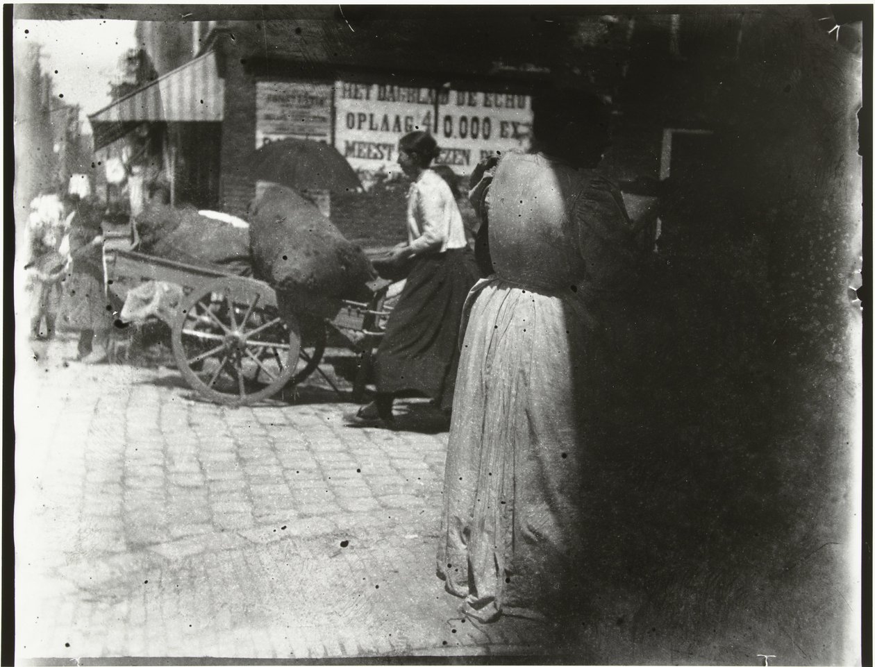 Aktywność na Houtkopersdwarsstraat i Jodenbreestraat w Amsterdamie autorstwa George Hendrik Breitner