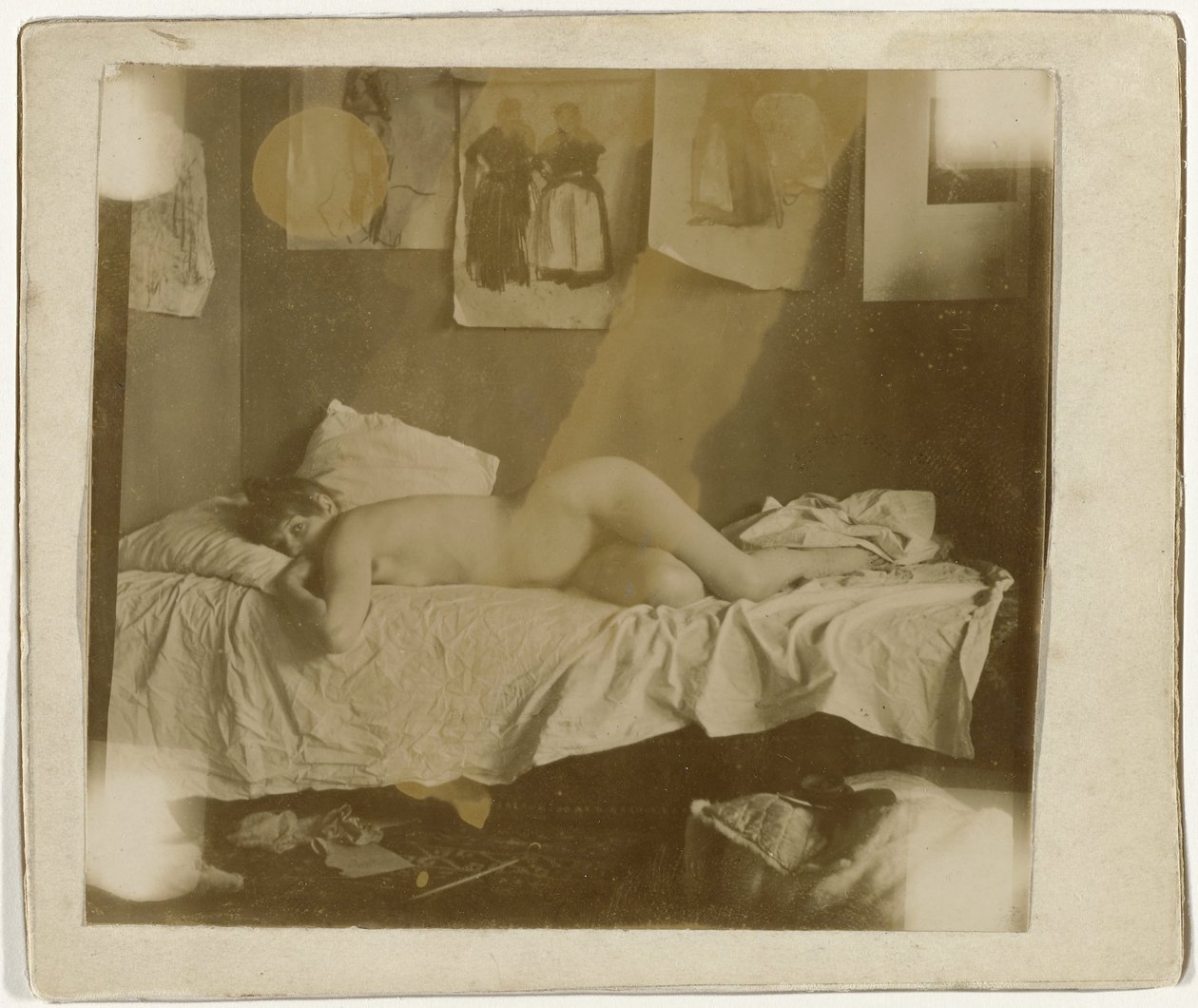 Marie Jordan leży naga na łóżku autorstwa George Hendrik Breitner