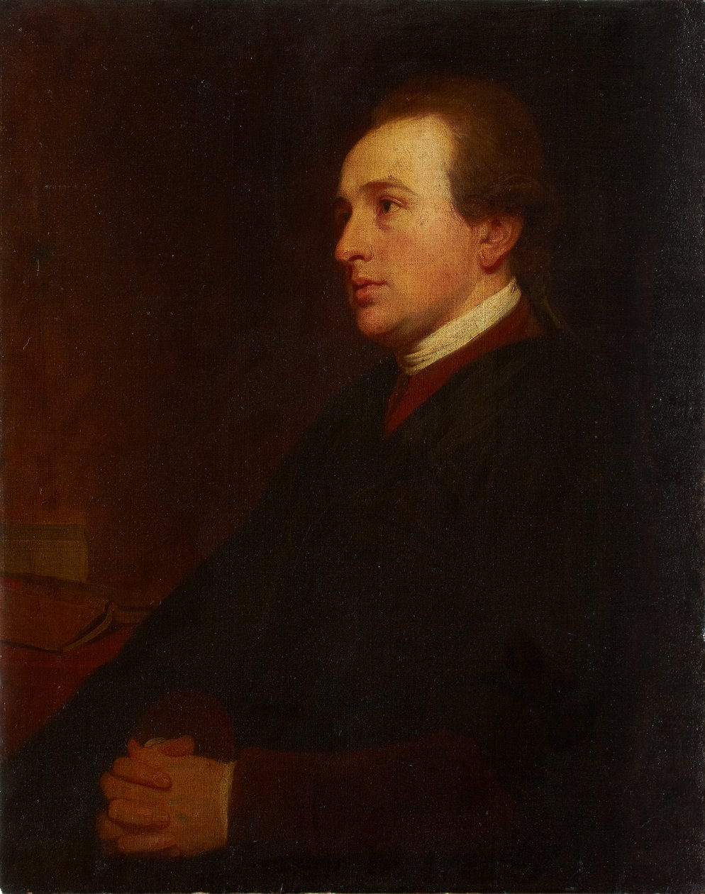 Portret młodego mężczyzny przy biurku autorstwa George Romney