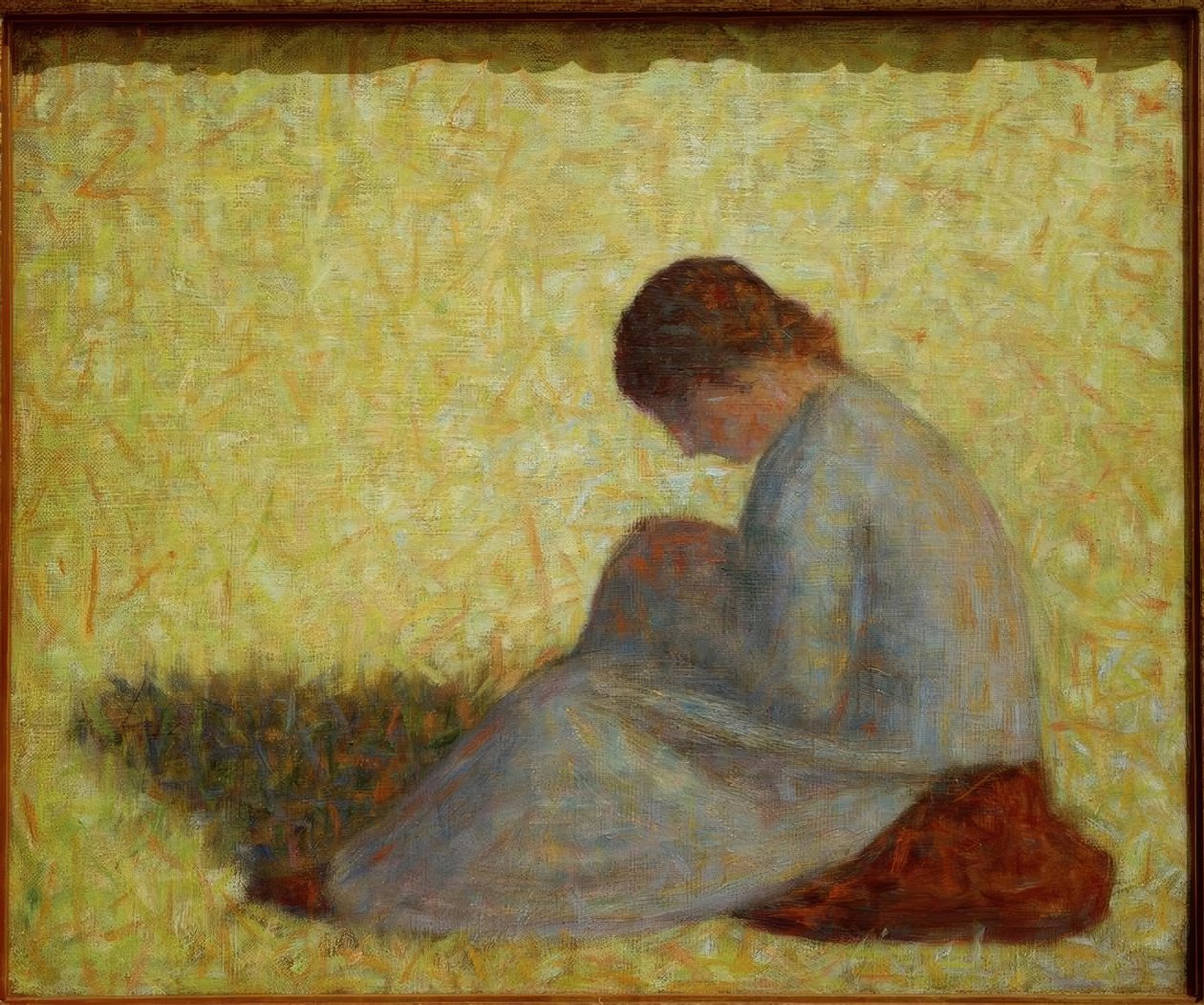 Chłopka siedząca na trawie autorstwa Georges Seurat