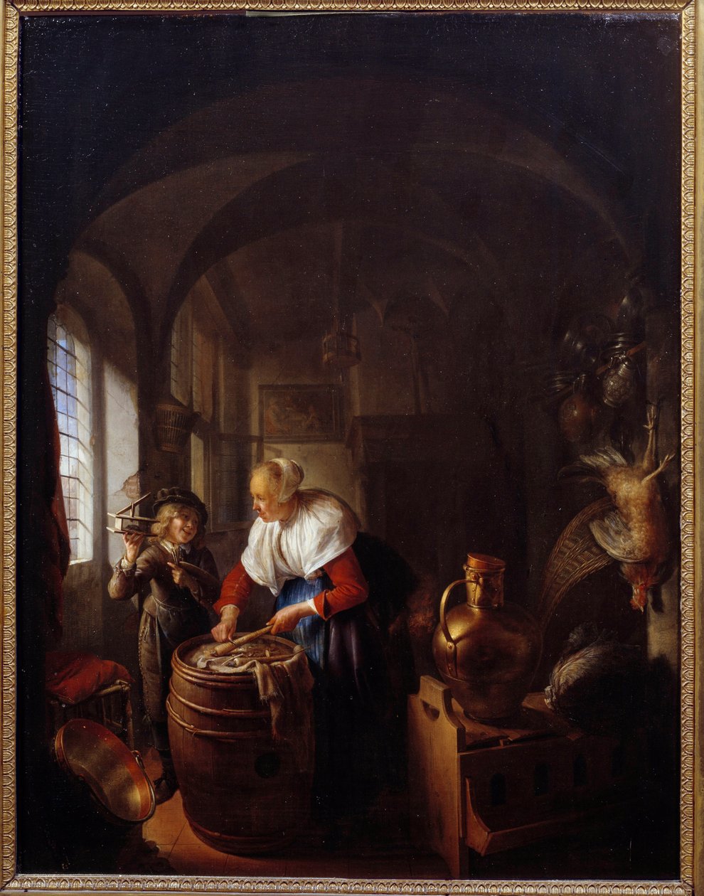 Mysz. Dziecko pokazuje matce pułapkę na myszy. Obraz Gerarda Dou (1613-1675), Hol. autorstwa Gerrit Dou