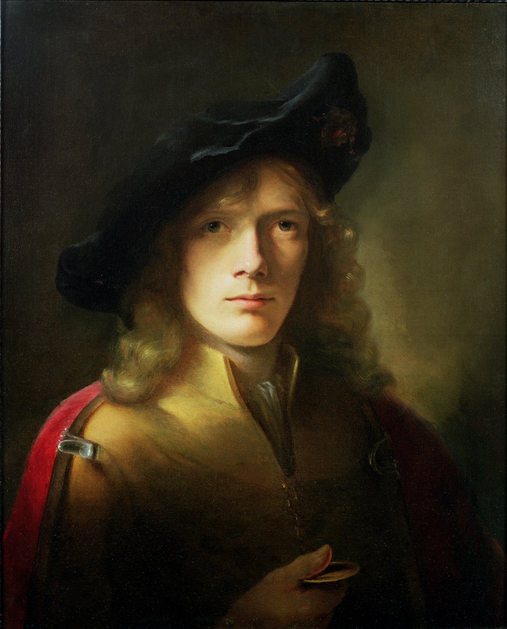 Portret młodego mężczyzny trzymającego medal autorstwa Godfrey Kneller
