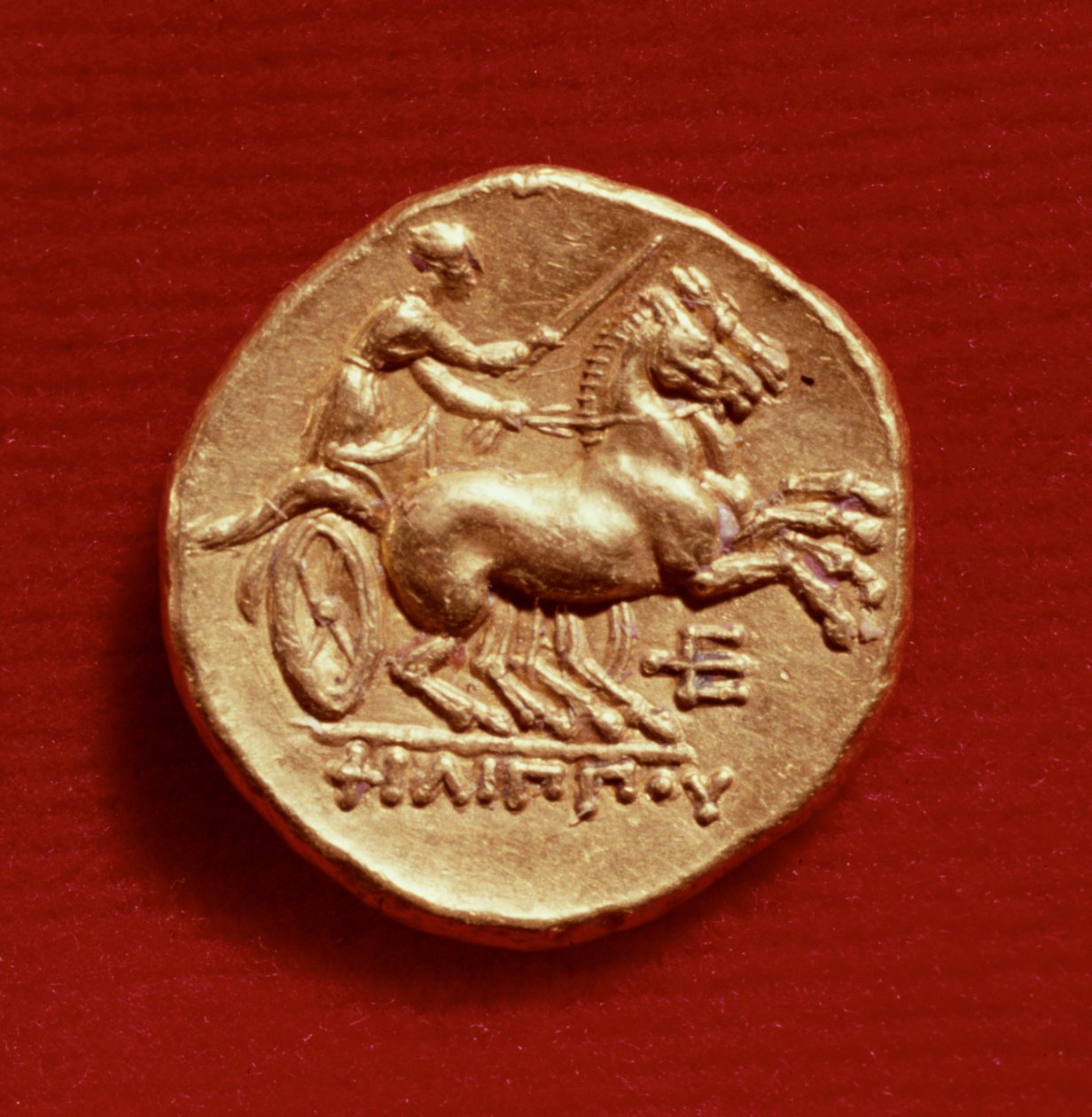 Rewers statera Filipa II (382-336 pne) Macedonii przedstawiający woźnicę, 356-336 pne (złoto) autorstwa Greek School