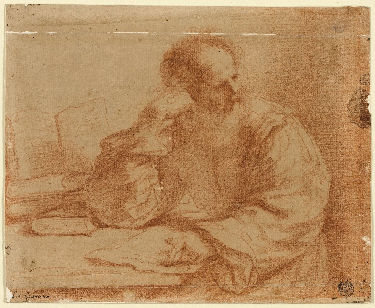 Brodaty mężczyzna siedzący przy stole autorstwa Guercino