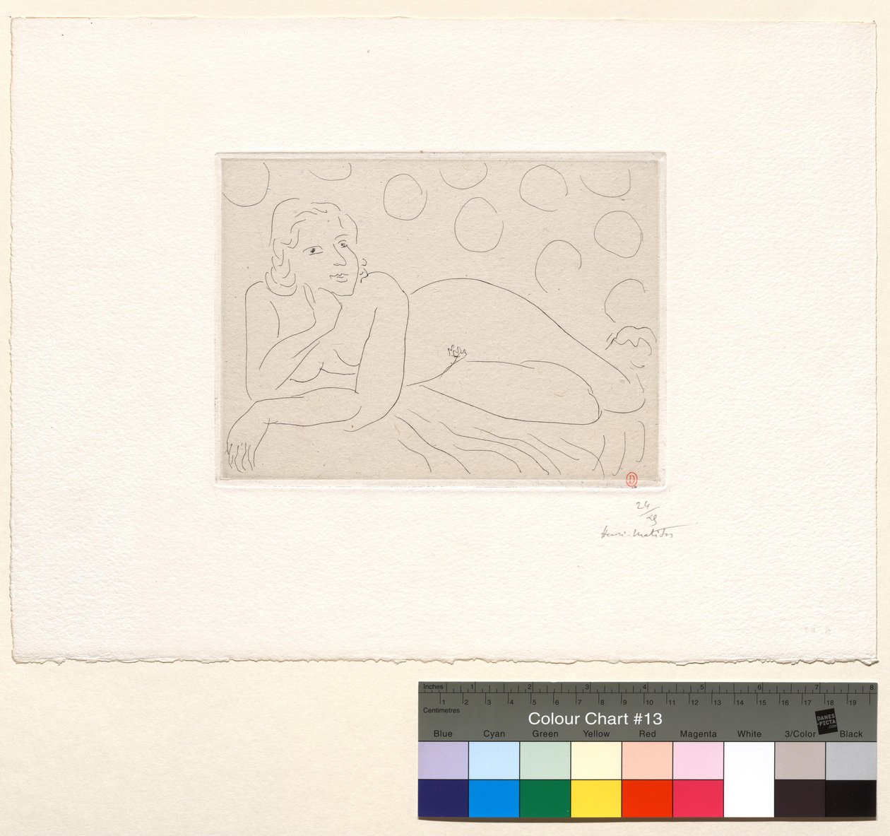 Leżący akt na tle o kolistych wzorach autorstwa Henri Matisse