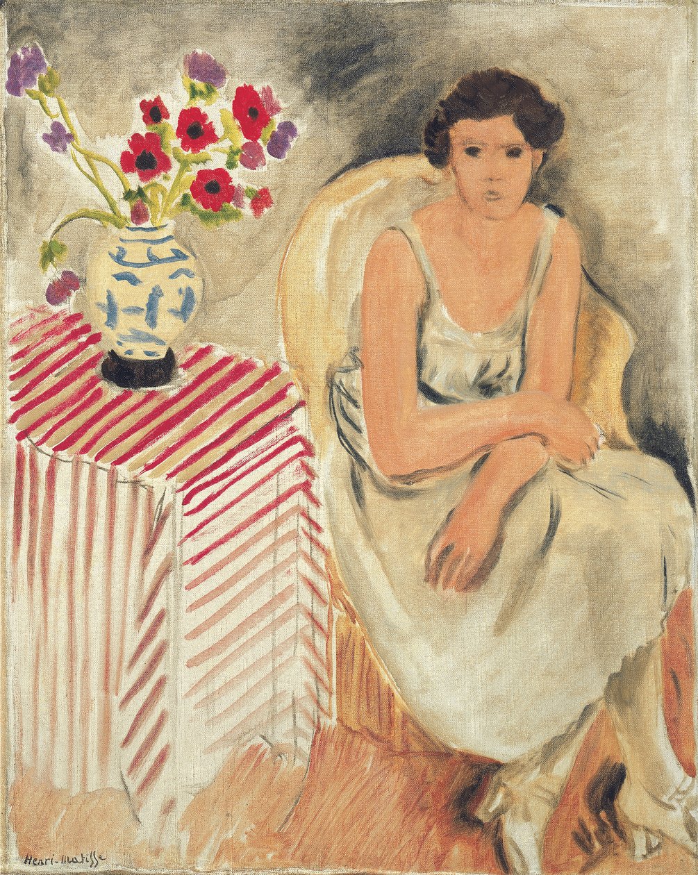 Kobieta na krześle - Kwiaty na stole lub goździki autorstwa Henri Matisse