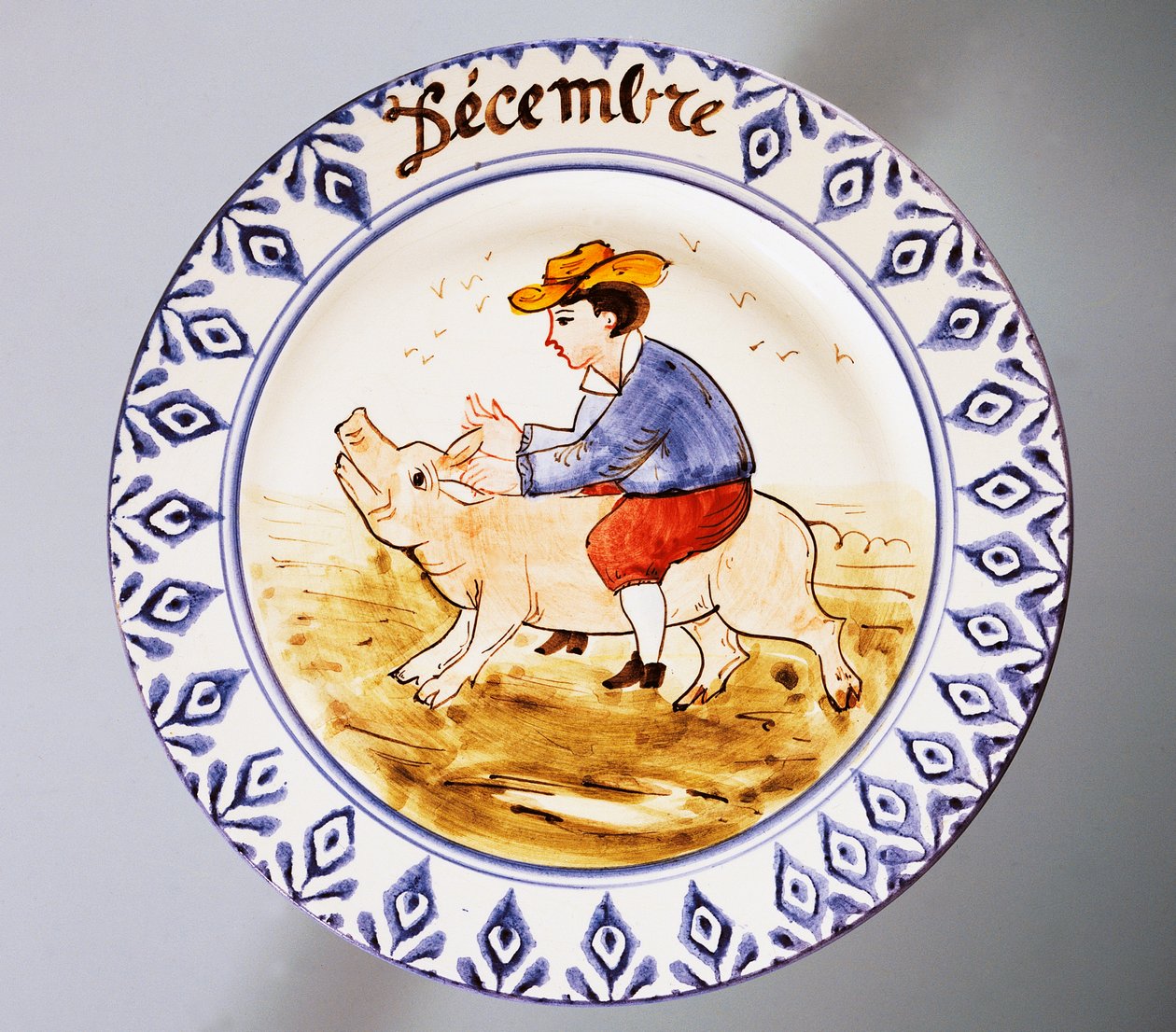 Talerz przedstawiający miesiące, grudzień, ceramika, produkcja Nove di Bassano, region Veneto, Włochy, XX wiek. autorstwa Italian School