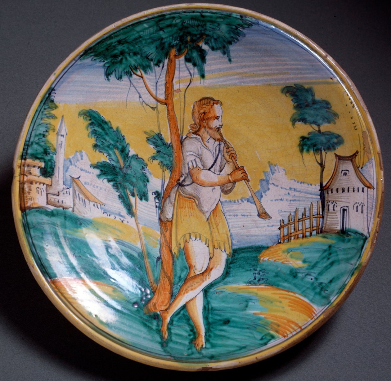 Sztuka renesansu: dekoracja talerza flecisty (flecista) - koniec XVI wieku Produkcja Viterbo (Viterbo), Włochy Florencja, Museo Nazionale del Bargello autorstwa Italian School