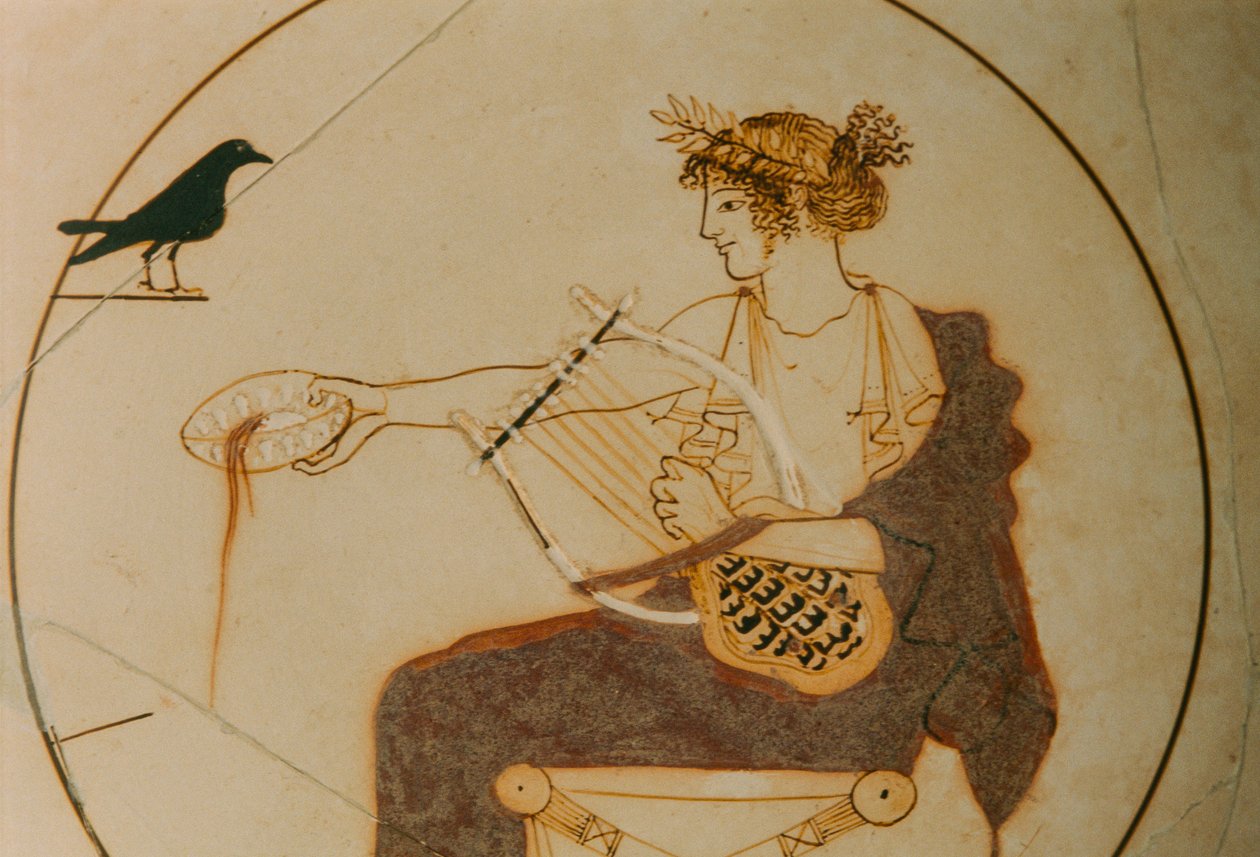 Biały kylix ozdobiony przedstawieniem Apolla. Bóg siedzi na... autorstwa James L Stanfield