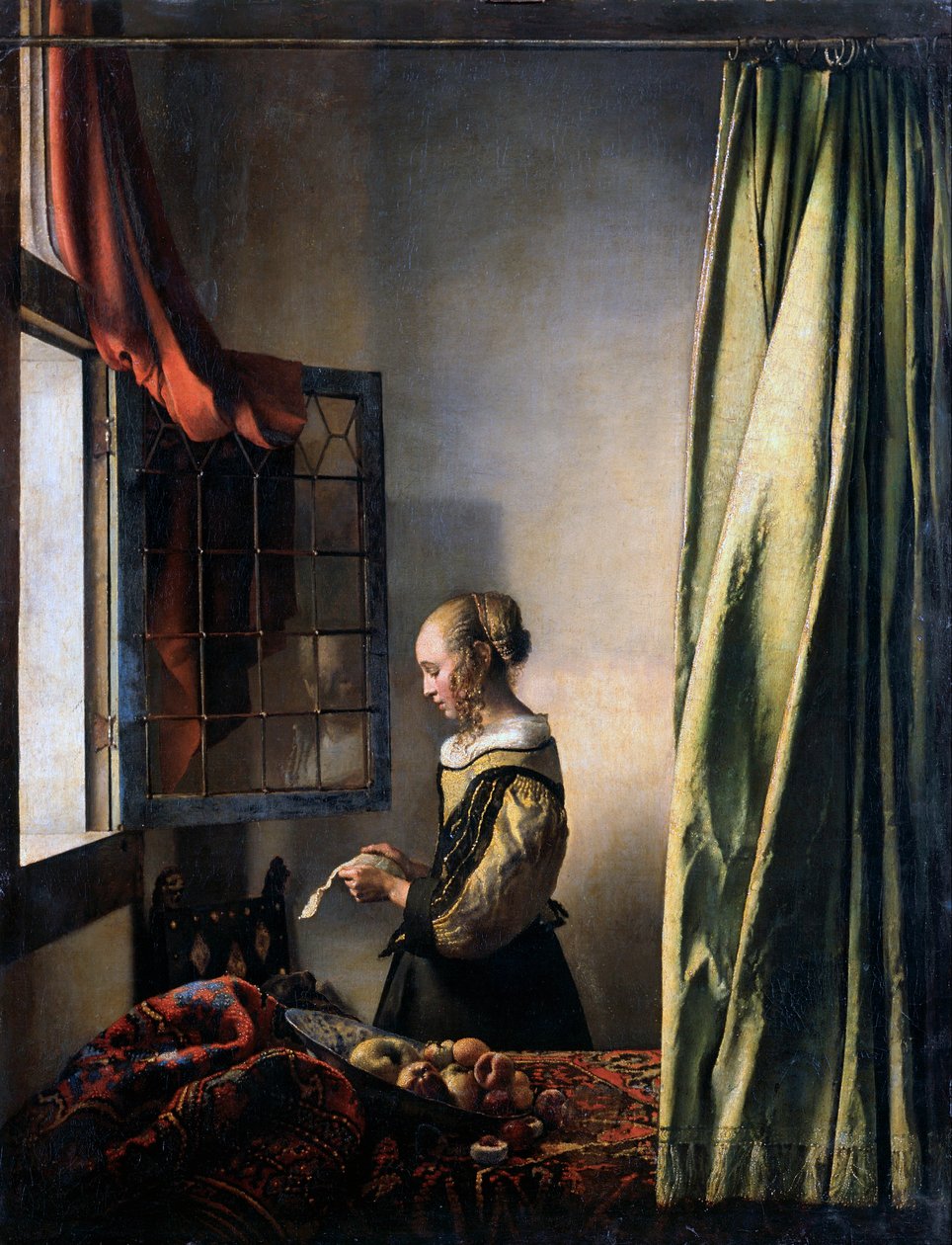 Dziewczyna czytająca list przy otwartym oknie, ok. 1659 autorstwa Jan Vermeer van Delft