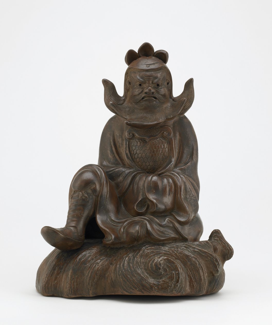 Figura Shoki, demona quellera, siedzącego na skale, Imbe, prefektura Okayama, okres Edo lub era Meiji (ceramika) autorstwa Japanese School
