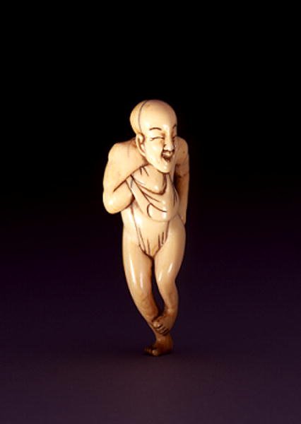 Netsuke mężczyzny z twarzą konia i kopułą, prawdopodobnie Osaka, ok. 1800-20 (kość słoniowa) (patrz także 193635) autorstwa Japanese School