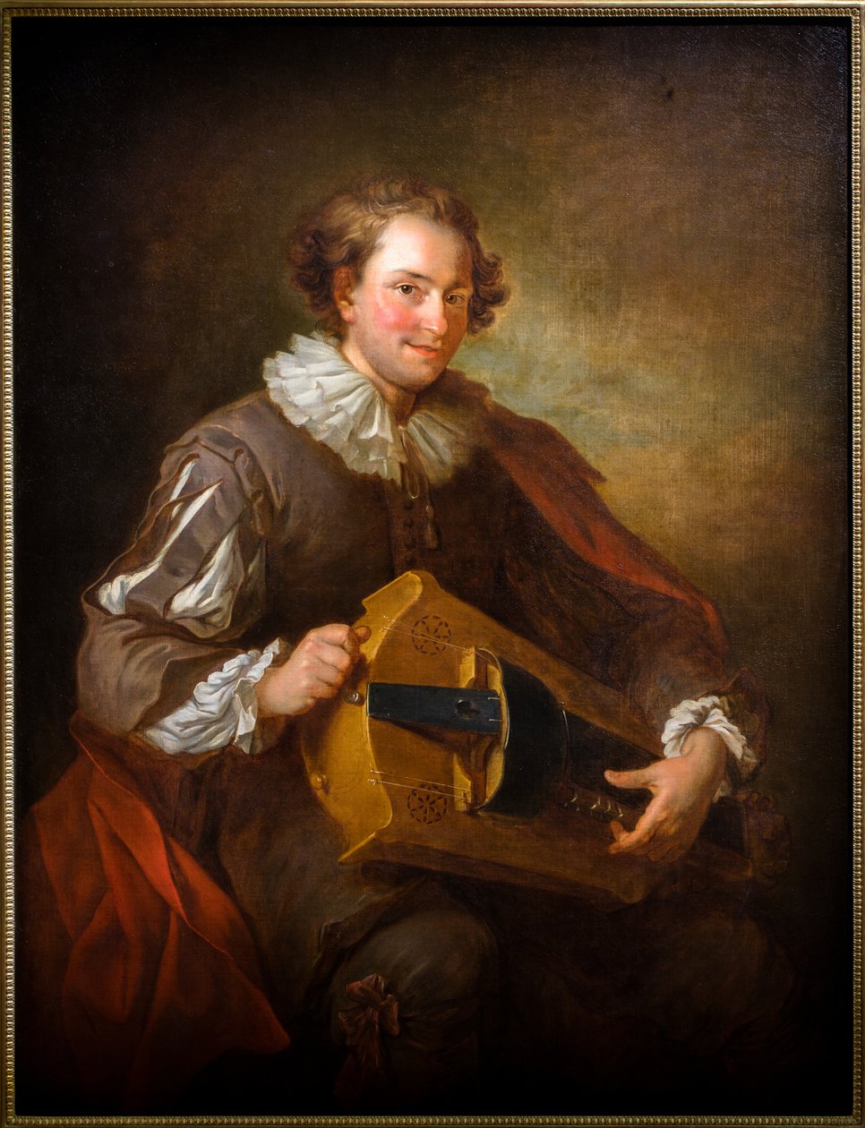 Portret grającego na lirze korbowej autorstwa Jean Alexis Grimou