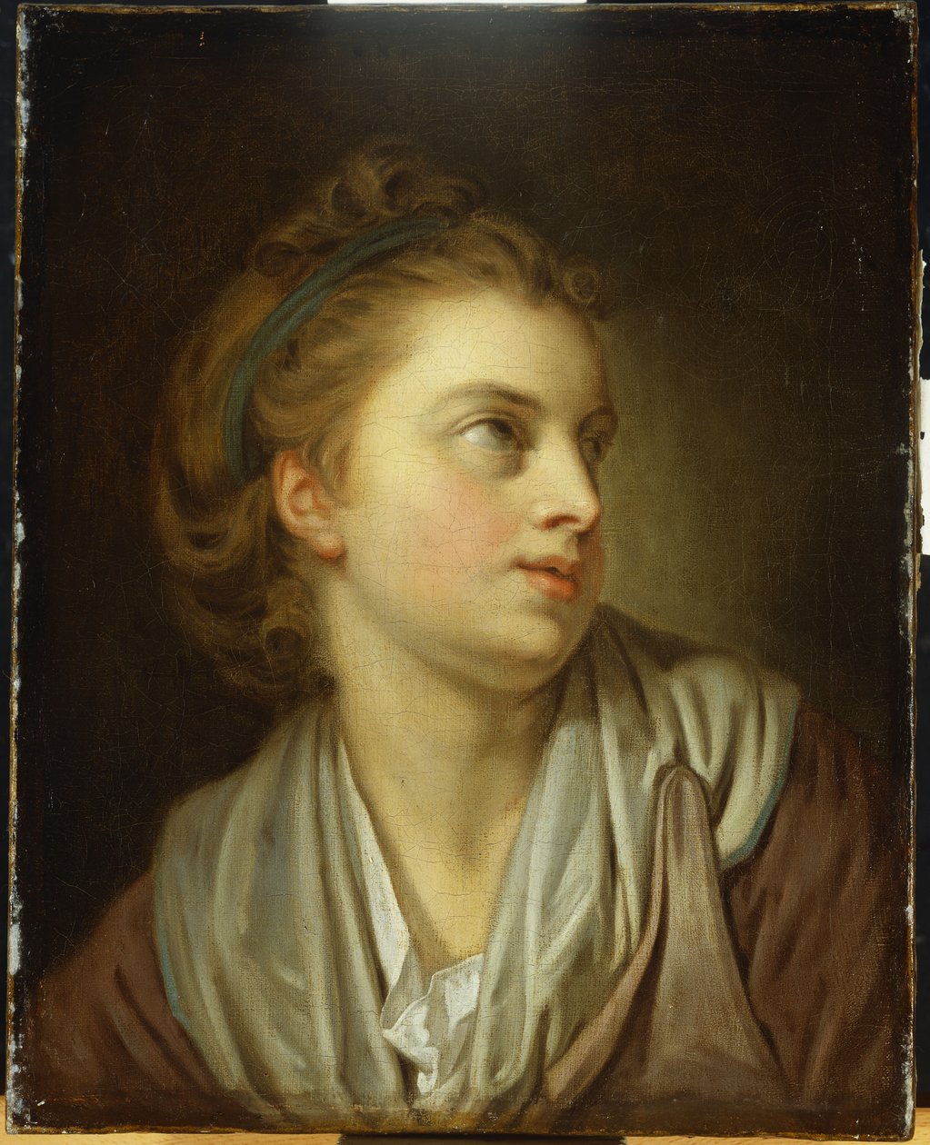 Dziewczyna, długość biustu, z zieloną opaską do włosów, patrząca w górę autorstwa Jean Baptiste Greuze