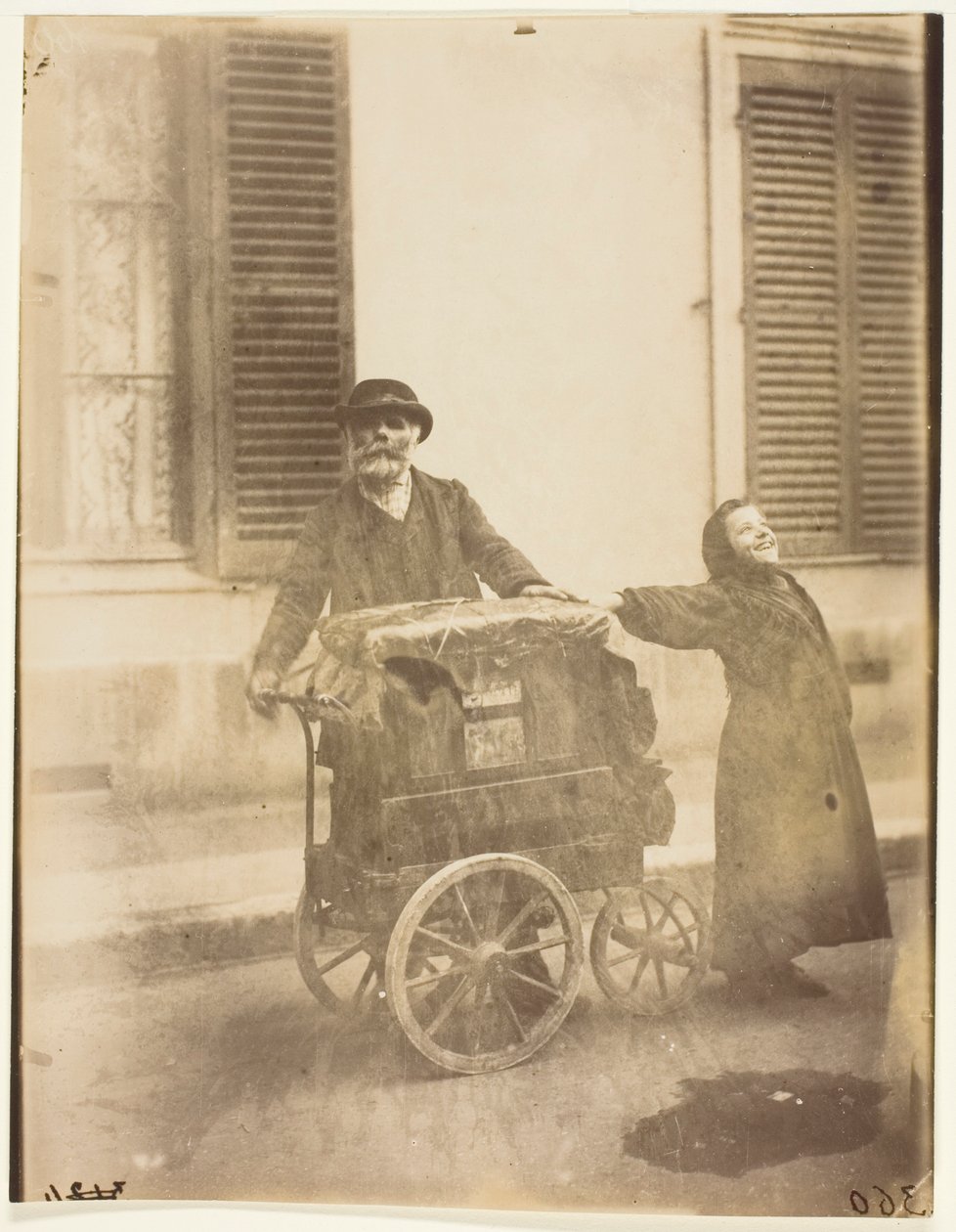 Organista autorstwa Jean Eugène Auguste Atget
