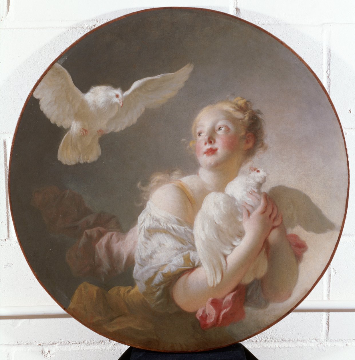 Dziewczyna trzymająca gołębia autorstwa Jean Honore Fragonard