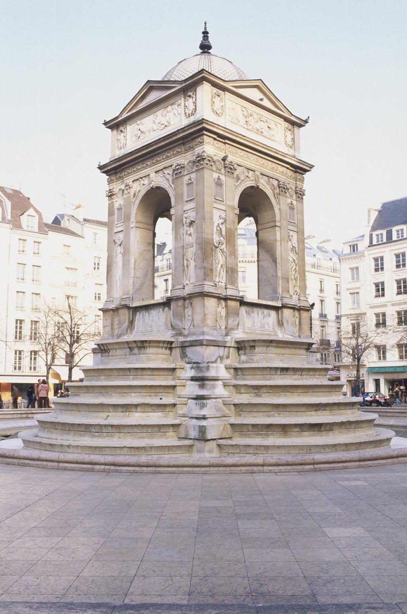 Francja, Paryż, Fontaine des Innocents, kamienna fontanna ze schodami. autorstwa Jean and Lescot Pierre Goujon
