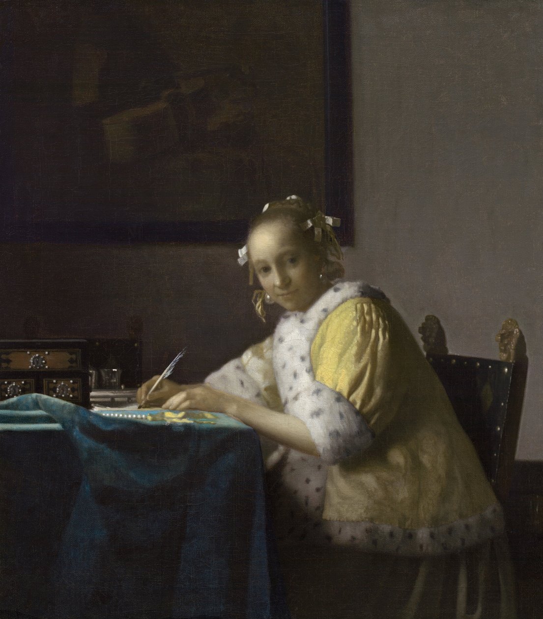 Kobieta pisząca autorstwa Johannes Vermeer
