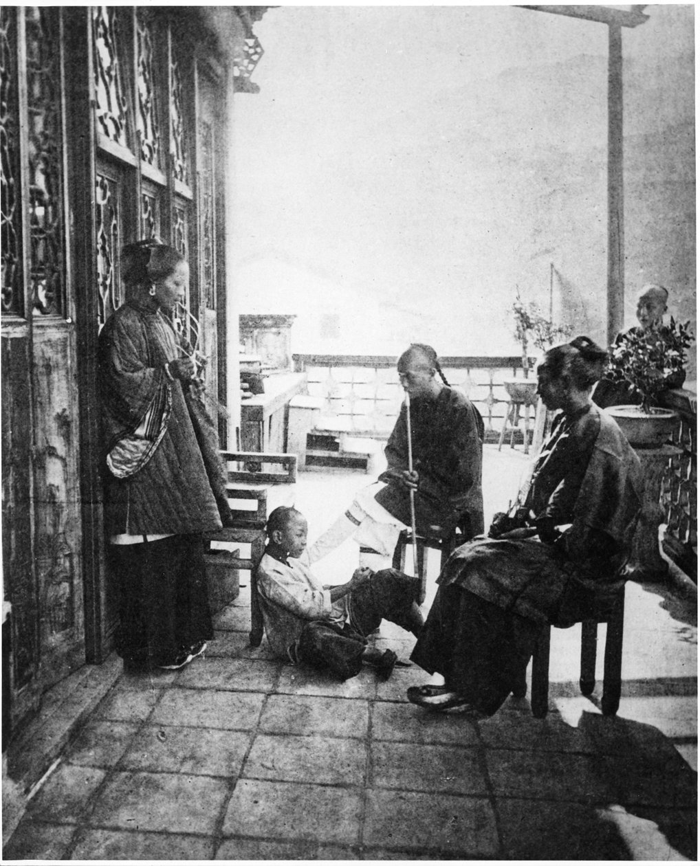 Spotkanie po kolacji na werandzie domu Chińczyka, ok. 1867-72 autorstwa John Thomson