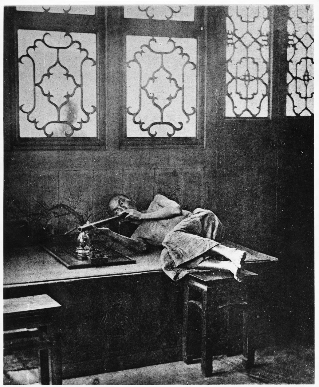 Palacz opium, ok. 1867-72 autorstwa John Thomson