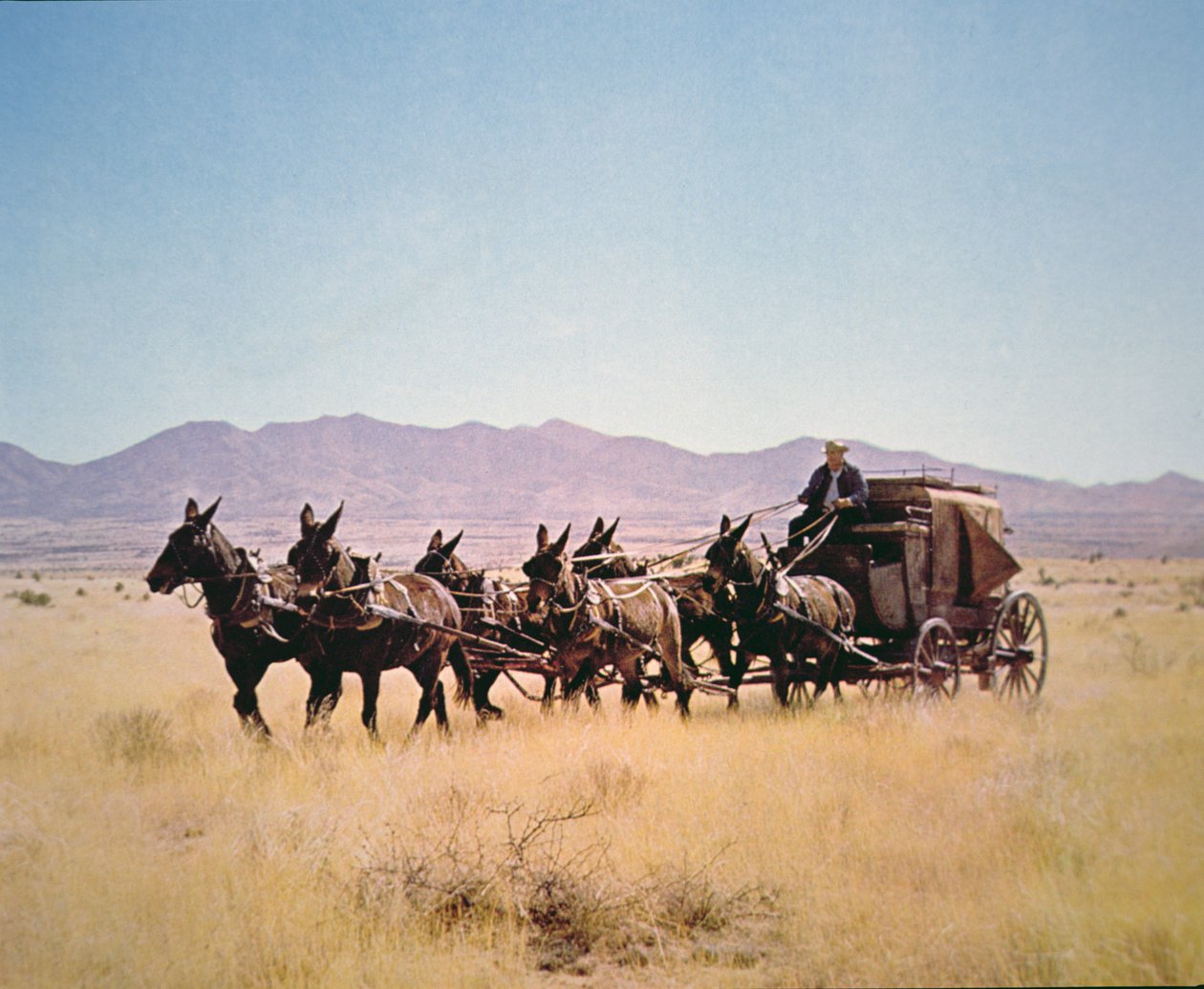 Western Stagecoach ciągnięty przez sześcioosobowy zespół (zdjęcie) autorstwa Walter Charles Mills