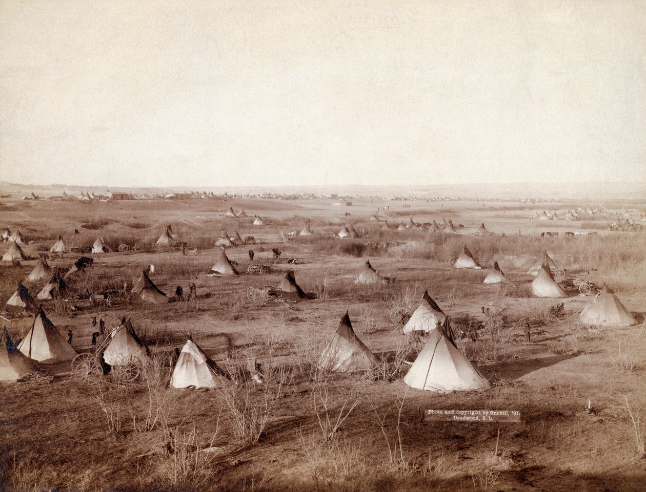 Wioska plemienna Lakota w 1891 roku autorstwa Johna Grabilla autorstwa John C. H. Grabill