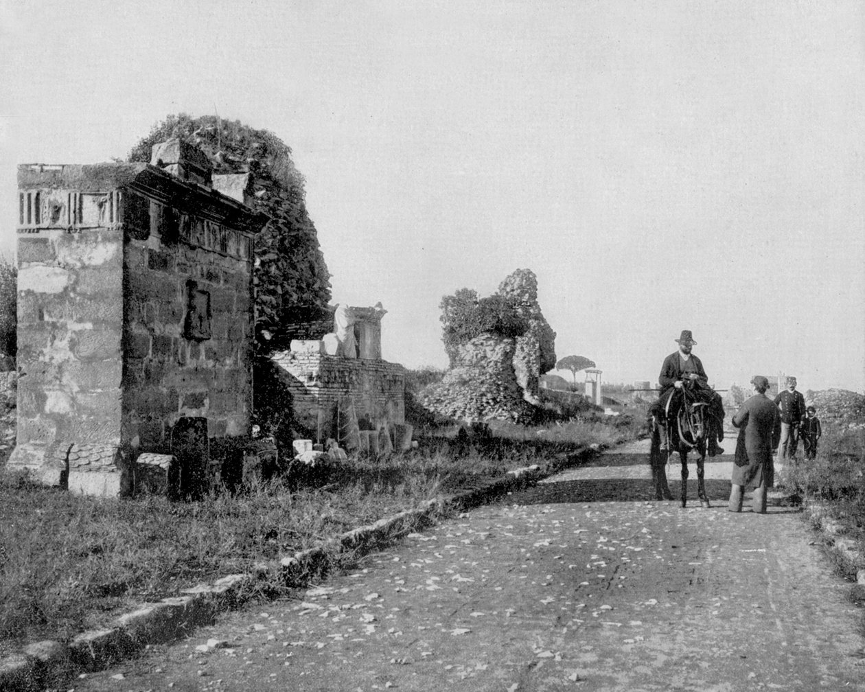 Droga Appia w Rzymie (zdjęcie czarno-białe) autorstwa John Lawson Stoddard