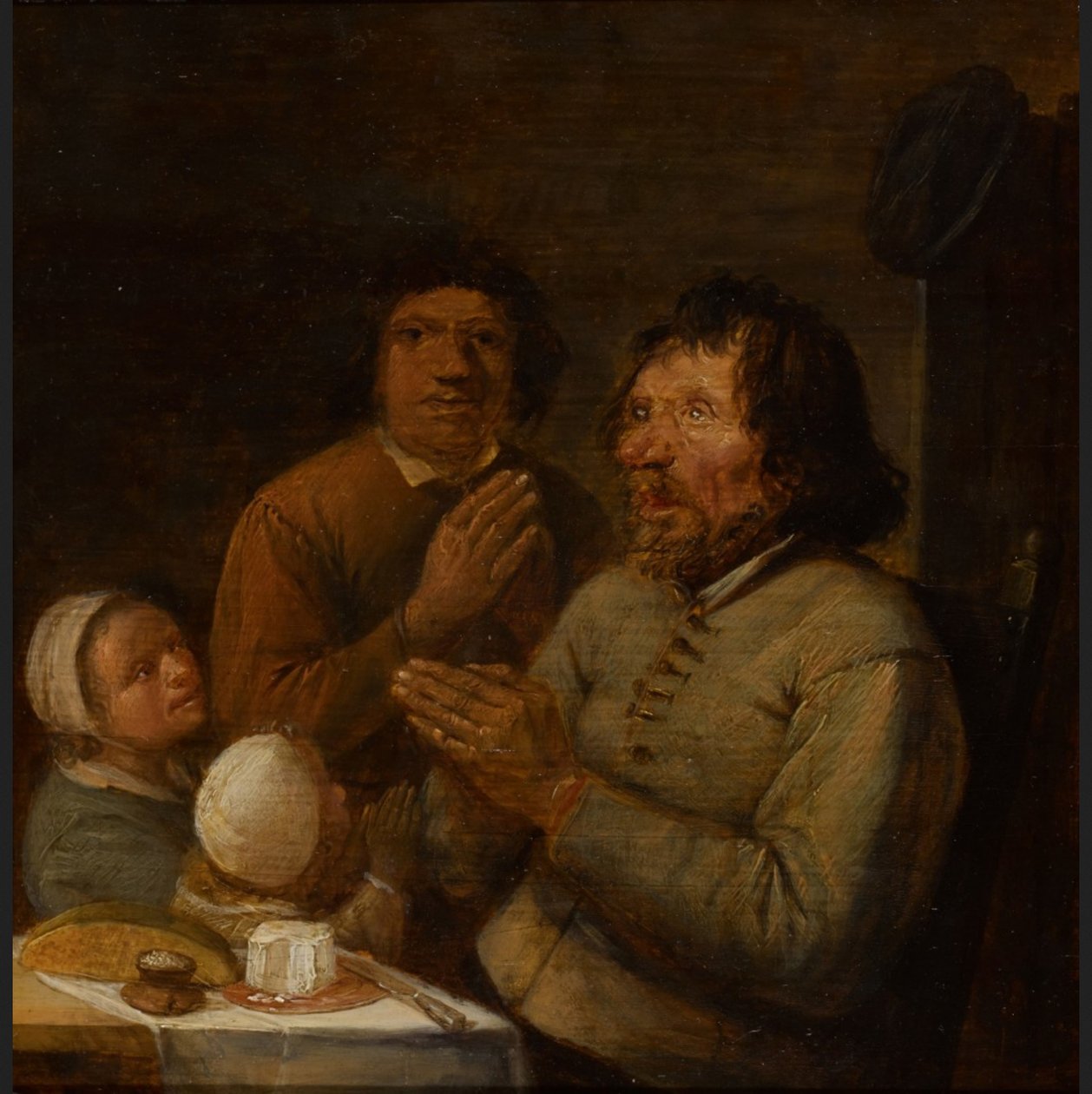 Wnętrze z modlącą się rodziną chłopską autorstwa Joos van Craesbeeck