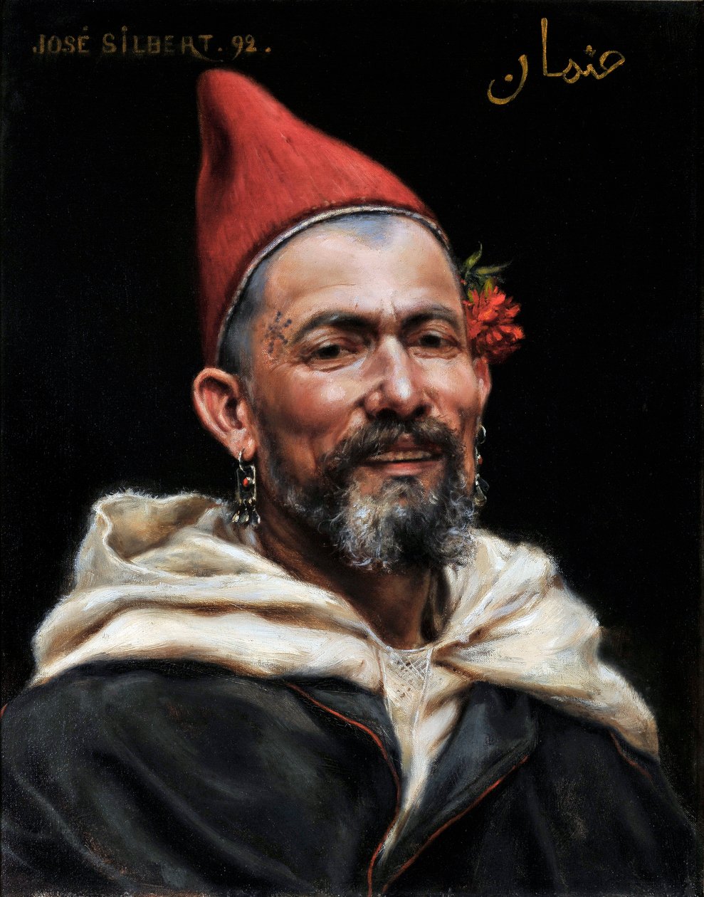 Głowa Maroka Portret mężczyzny z przekłutymi uszami i czerwonym kapeluszu, z kwiatem w uchu i tatuażem na świątyni 1892 (malarstwo) autorstwa Jose Silbert