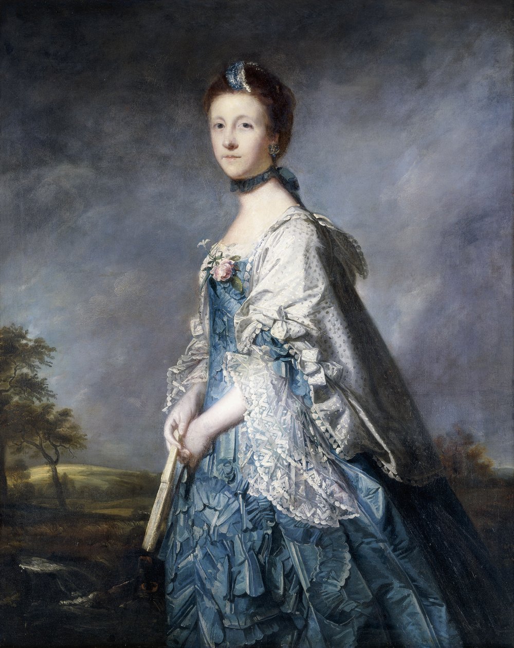 Portret Anny, hrabiny Winterton, stojącej trzy czwartej długości, ubranej w niebieską sukienkę i szal wykończony koronką, trzymającej wachlarz, w krajobrazie, autorstwa Joshua Reynolds