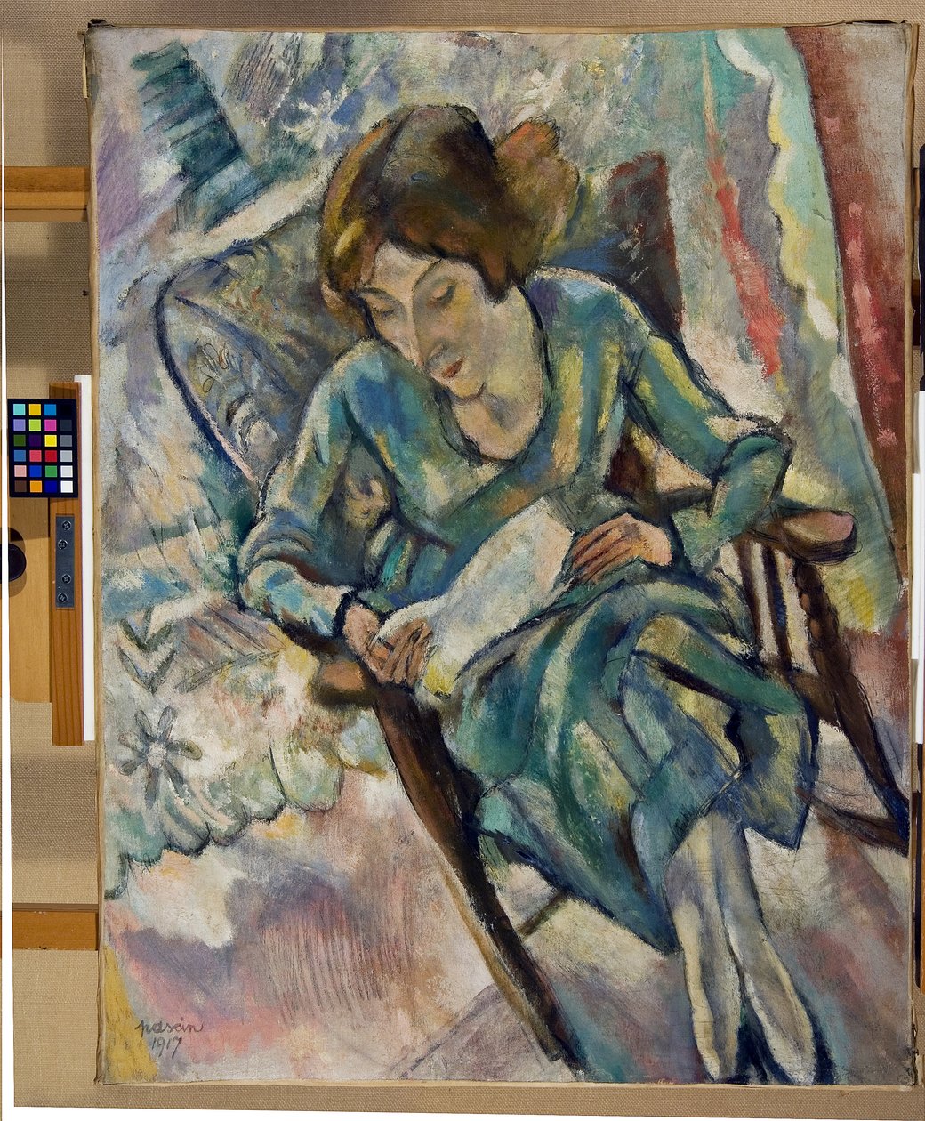 Dziewczyna w zielonym czytaniu, 1917 autorstwa Jules Pascin