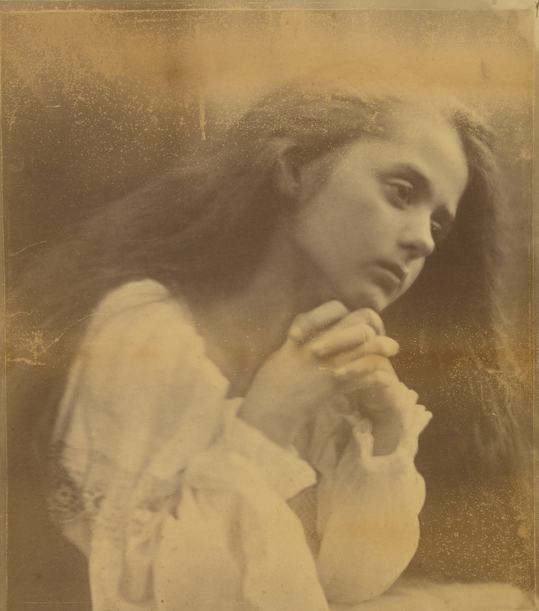Modląca się młoda dziewczyna autorstwa Julia Margaret Cameron