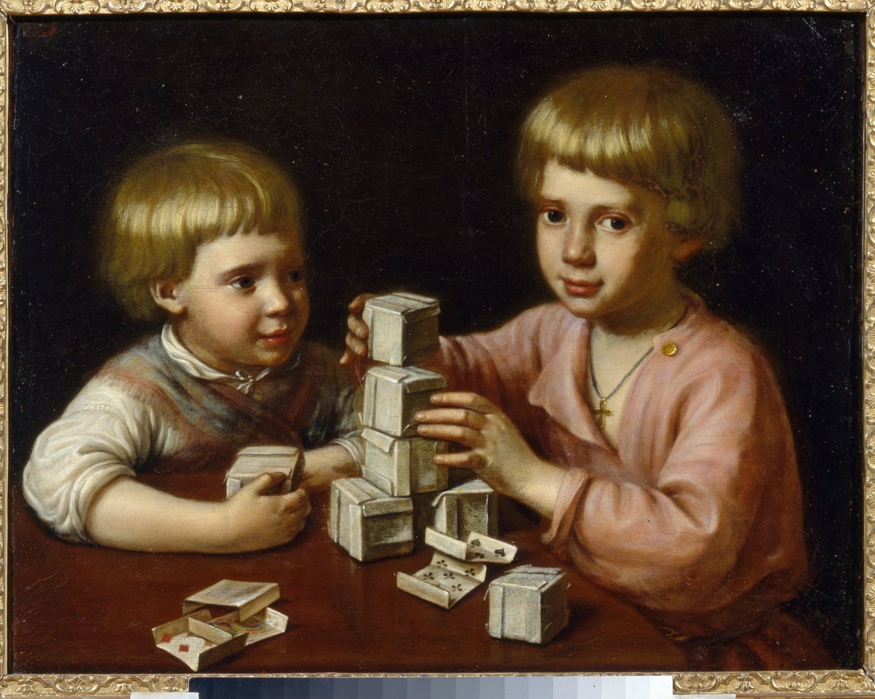 Dzieci bawiące się (dzieci bawiące się). Dwaj bracia, zrobiwszy kostki z kart do gry, układają je na stole. Obraz Kapitona Stepanovicha Pavlova (1792-1852), olej na płótnie autorstwa Kapiton Stepanovich Pavlov