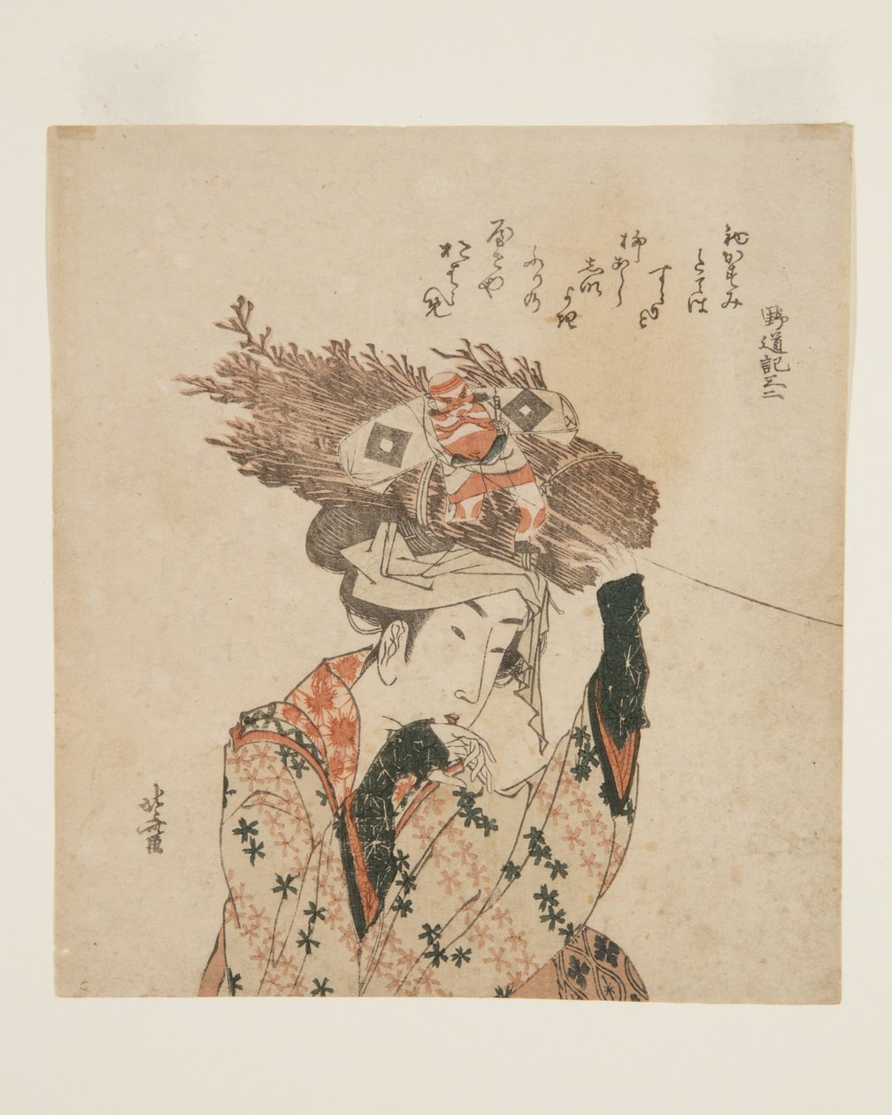 Kobieta z ?hara z wiązką drewna opałowego i latawcem (kolorowy drzeworyt) autorstwa Katsushika Hokusai