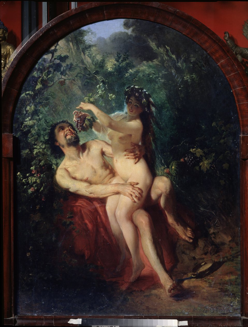 Satyr i nimfa. (Satyr i Nimfa). Naga i pijana para, nimfa na kolanach satyra karmi go kiścią winogron, zerwanych z otaczających ich winorośli. Obraz Konstantina Jegorowicza Makowskiego (Konstantyna Makowskiego) (1839-1915), olej autorstwa Konstantin Egorovich Makovsky