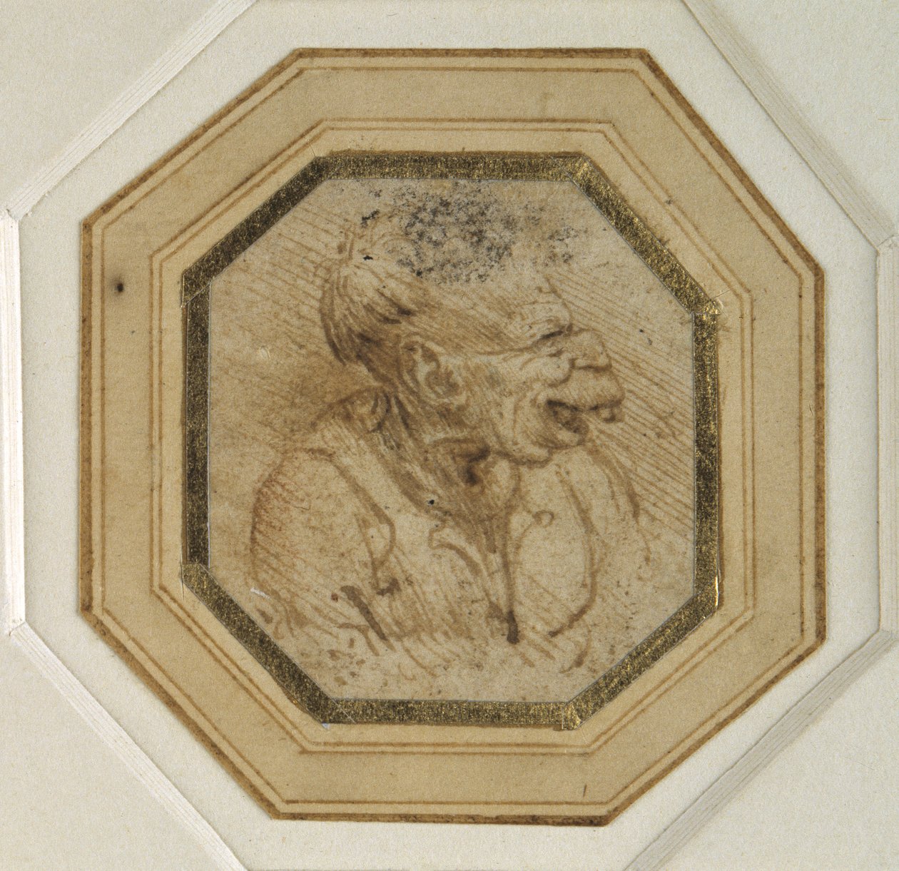 Groteskowa głowa (pióro i tusz na papierze) autorstwa Leonardo da Vinci