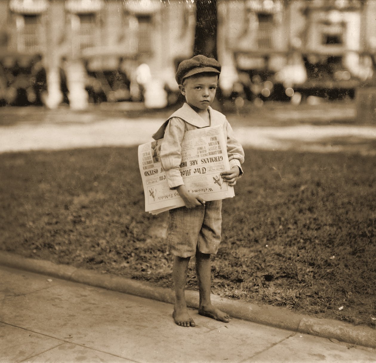 Portret sprzedawcy gazet, ok. 1910 autorstwa Lewis Wickes Hine