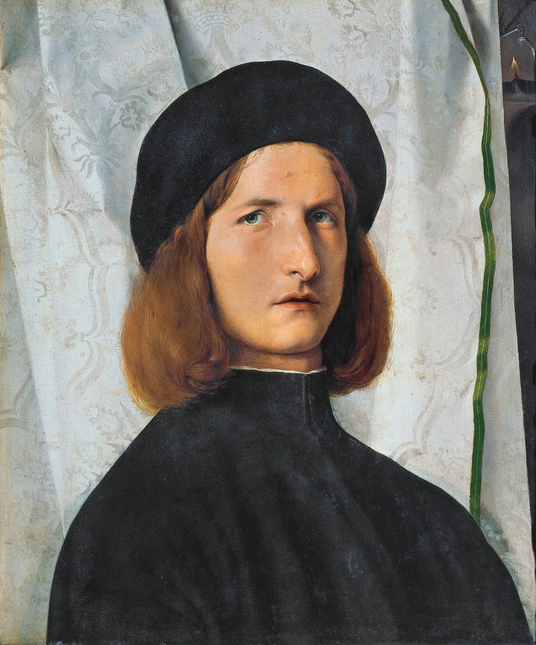 Portret młodego mężczyzny z lampą, 1508 autorstwa Lorenzo Lotto