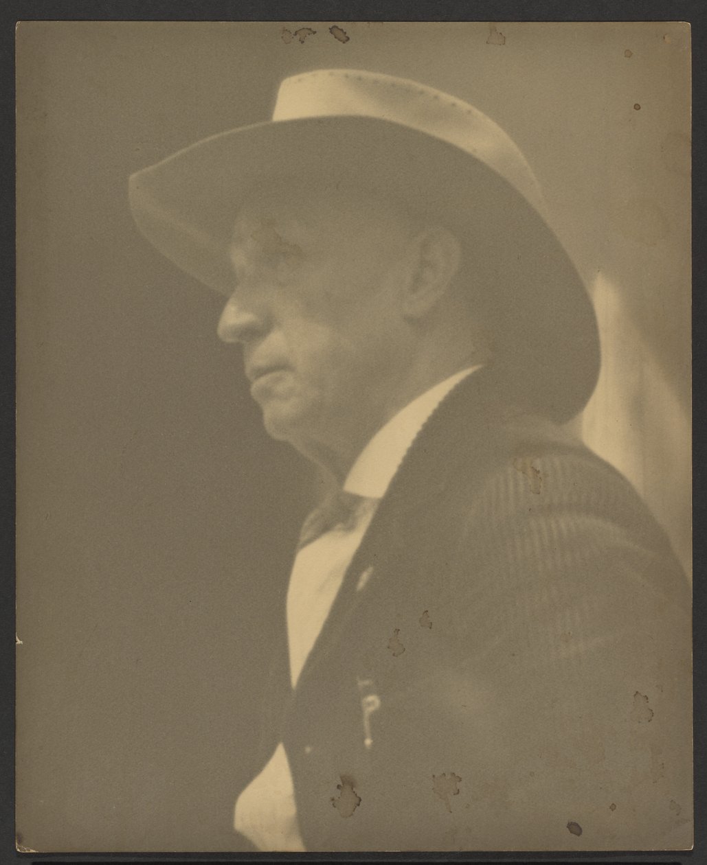 Portret mężczyzny w kapeluszu Stetson autorstwa Louis Fleckenstein