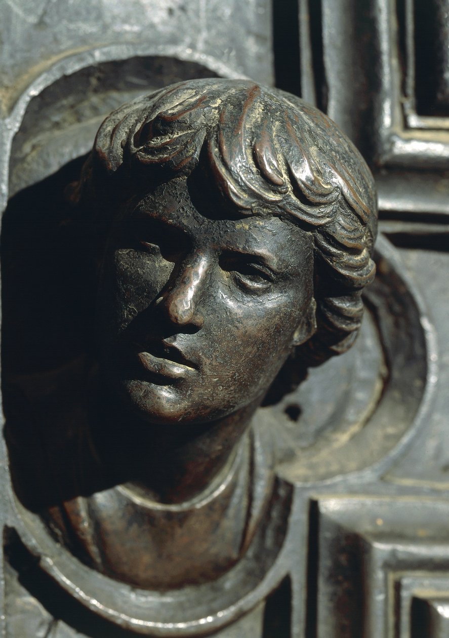 Głowa Giuliano de Medici, detal z brązu na drzwiach autorstwa Luca della Robbia (1400-1481). Nowa Zakrystia, Katedra Santa Maria del Fiore we Florencji. Włochy autorstwa Luca Della Robbia