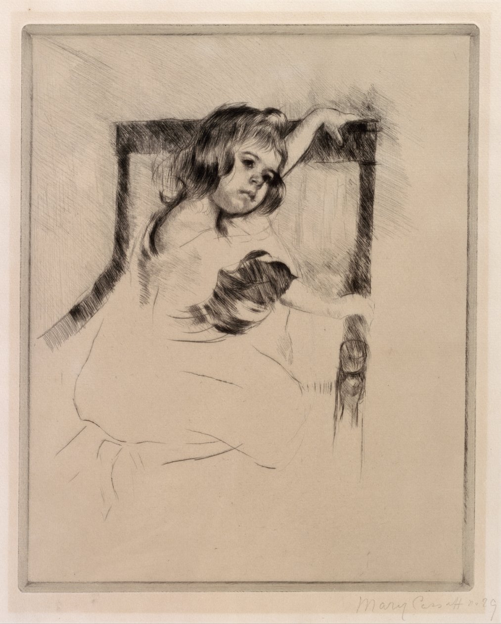 Klęcząc w fotelu autorstwa Mary Cassatt
