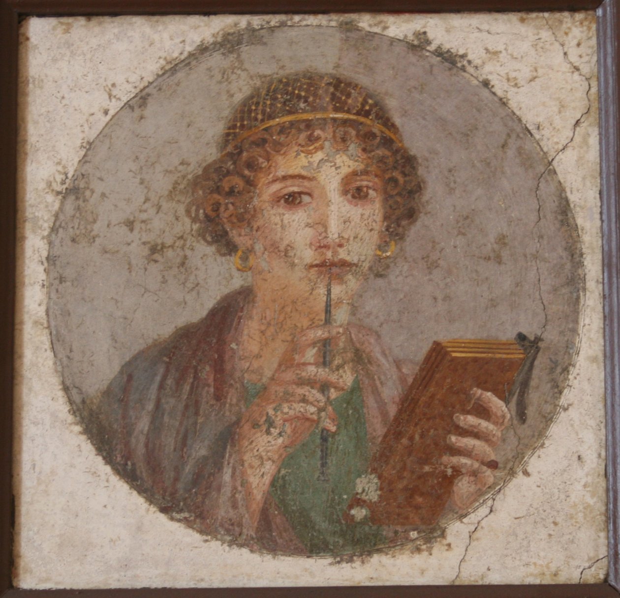 Młoda kobieta z książką i rysikiem tzw. Safona, ok. 50 autorstwa Master of Herculaneum