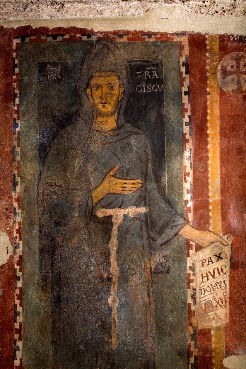 Reprezentacja świętego Franciszka z Asyżu (1181-1226) Jest to z pewnością pierwsze przedstawienie świętego wykonane za życia, przedstawiające bez piętna i bez aureoli. Trzyma papier lub jest napisany po łacinie „” Pax huic Domui”” (Peace autorstwa Master of Saint Francis of Assisi