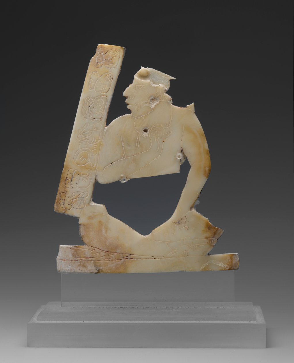 Siedząca postać, ok. 550-850 (muszla) autorstwa Mayan