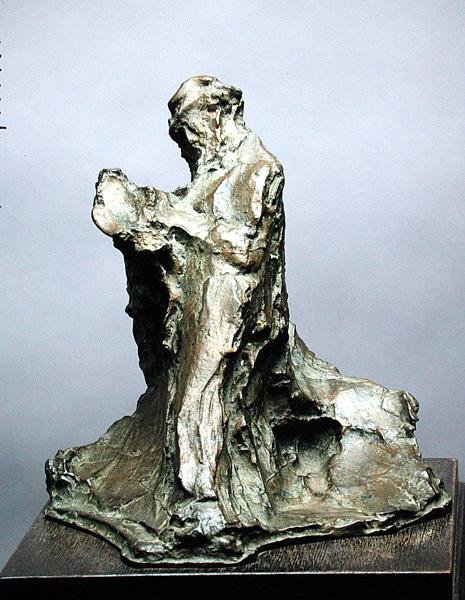 Mężczyzna czytający (efekt mężczyzny czytającego gazetę) autorstwa Medardo Rosso