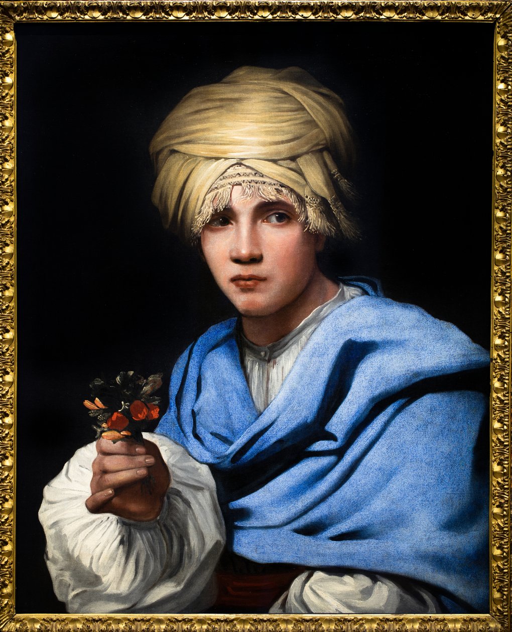 Chłopiec z turbanem trzymający bukiet kwiatów autorstwa Michael Sweerts