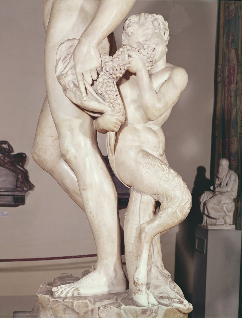 Bachus z młodym faunem detal młodego fauna, 1496-7 marmur autorstwa Michelangelo Buonarroti
