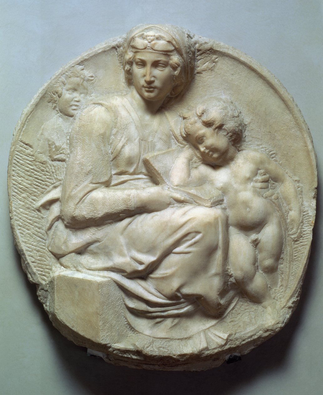 Pitti Tondo, ok. 1504 (marmur) autorstwa Michelangelo Buonarroti