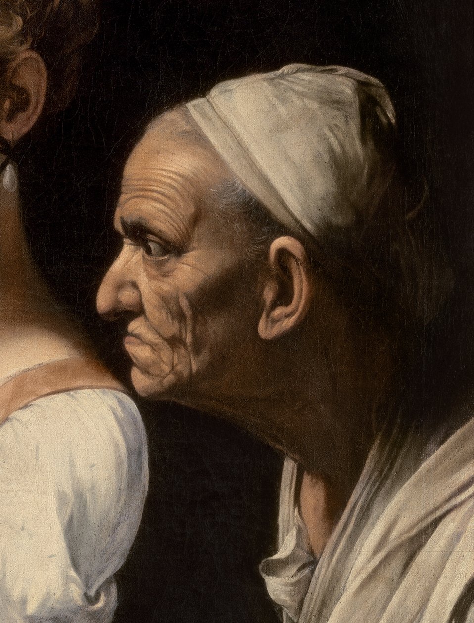 Fragment służącej z Judyty i Holofernesa, 1599 autorstwa Michelangelo Merisi Caravaggio